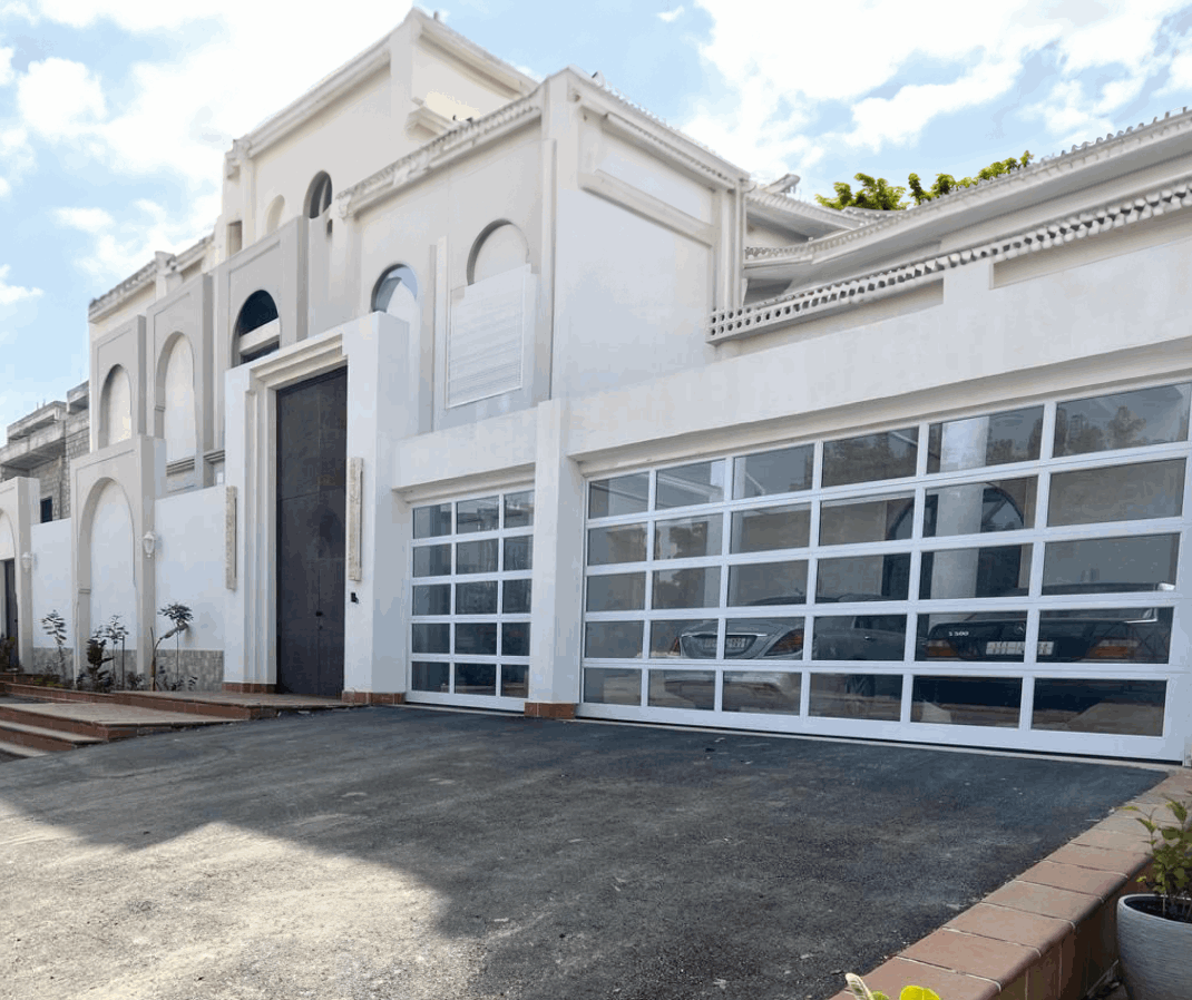 Modern panoramic garage door with sleek design and large glass panels